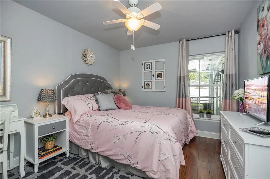 Guest room with clean bedding and calm styling