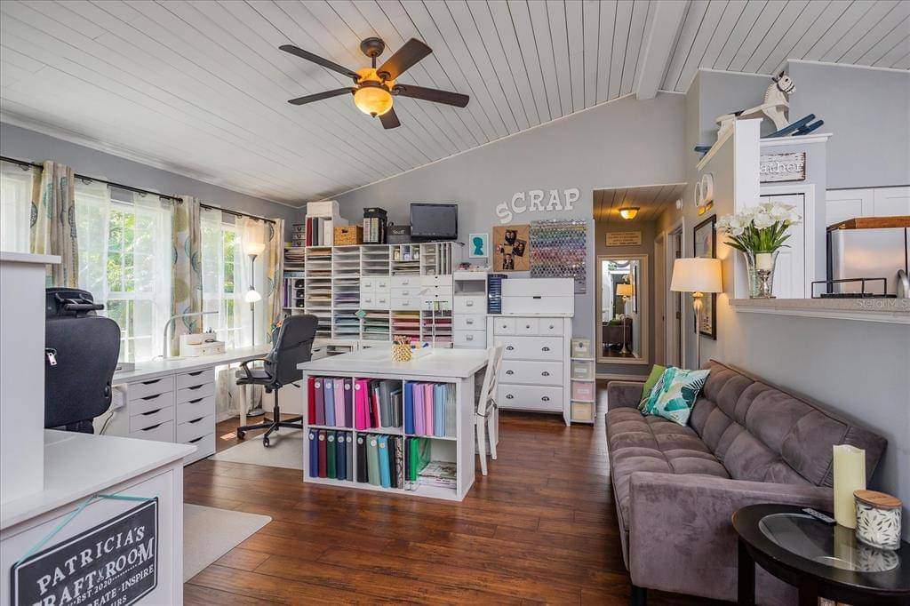 Organized home storage with labeled bins and neatly arranged household items